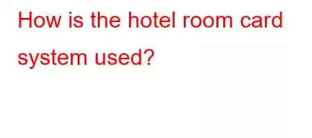 How is the hotel room card system used